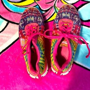 This is a pair of Skechers rainbow shoes. Barely warn. They are size 3 in kids.